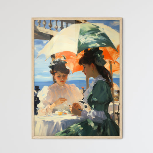 A Couple Of Women Sitting At A Table With Umbrellas Default Title