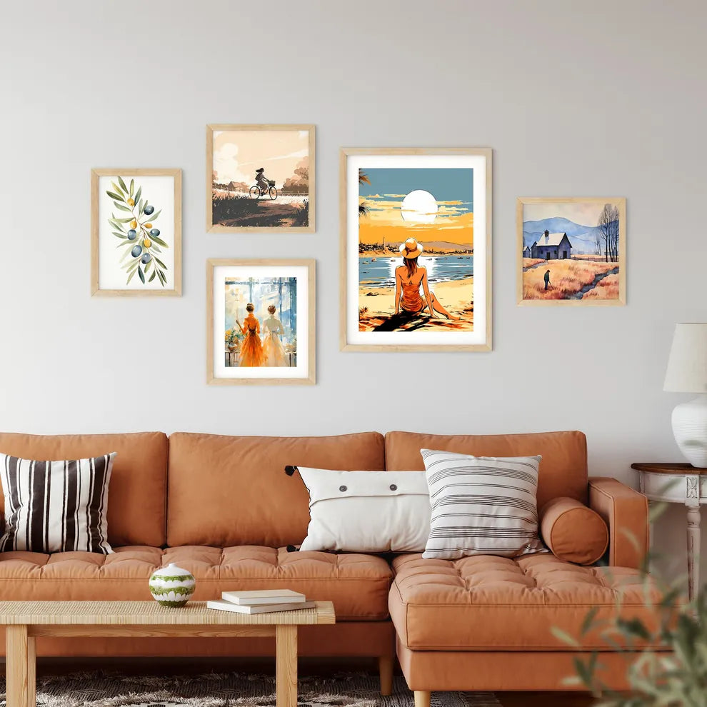 Woman Sitting On A Beach Looking At The Sun  Framed Print