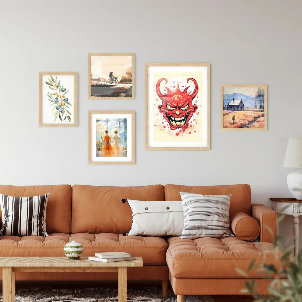 A Red Cartoon Face With Horns Framed Print