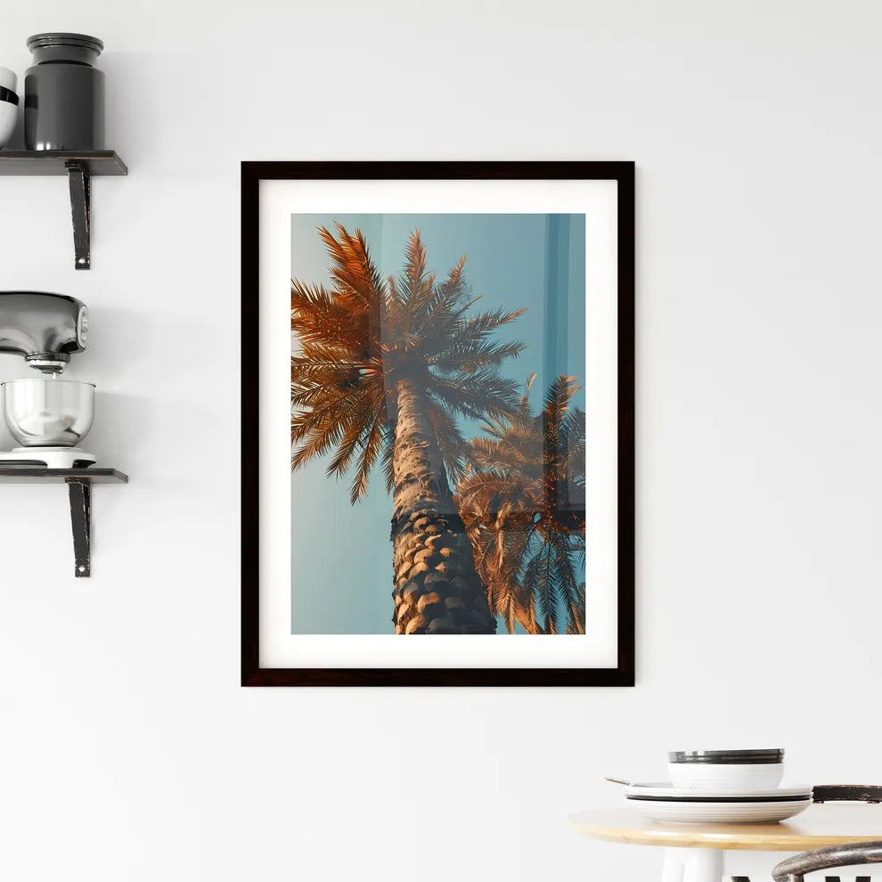 A Poster of two palm trees amidst a blue - A Framed Print