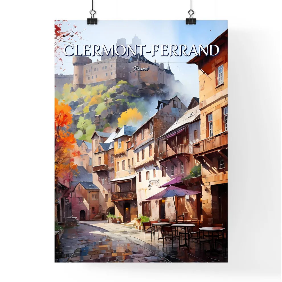 Clermont-Ferrand, France - Art print of a street with tables and chairs and a castle on the hill Poster