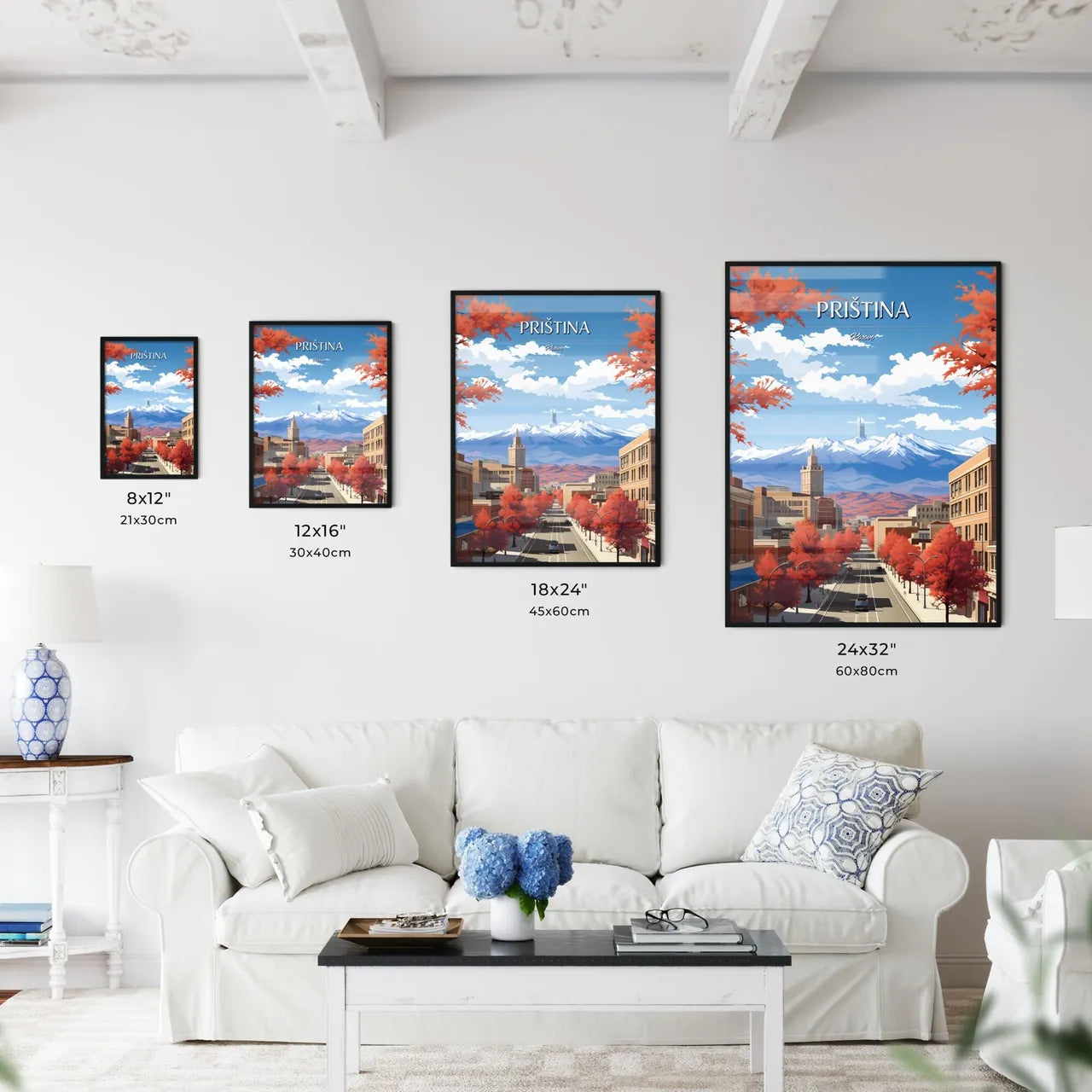 Priština, Kosovo - Art print of a city street with trees and mountains in the background Size Chart