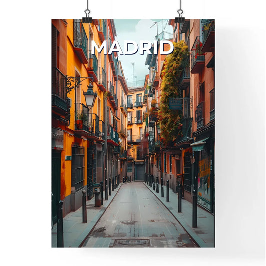 Madrid Street Art: Vibrant Painting on Narrow Street with Buildings and Greenery Poster