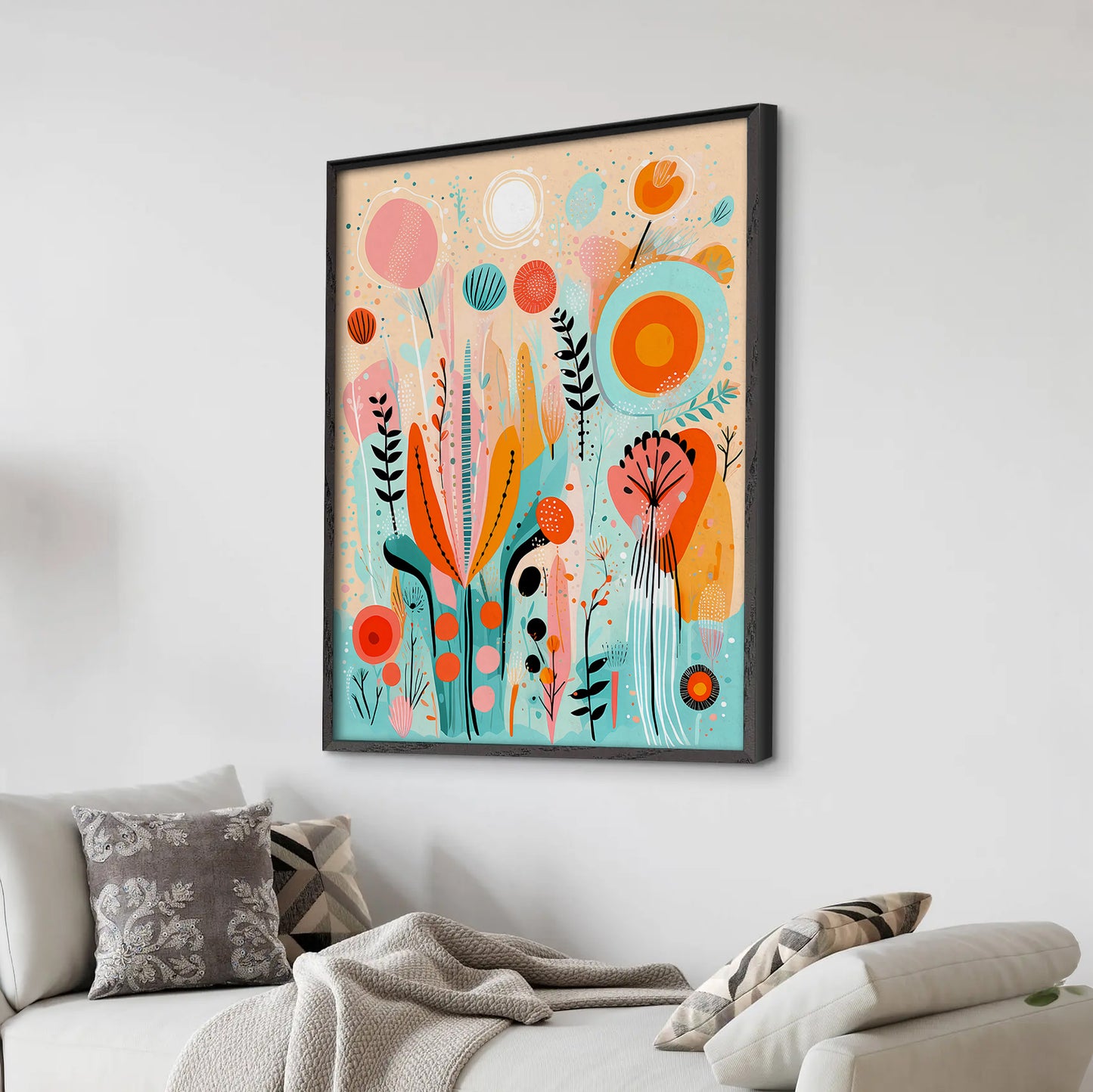 Colorful abstract art print on a wall above a sofa