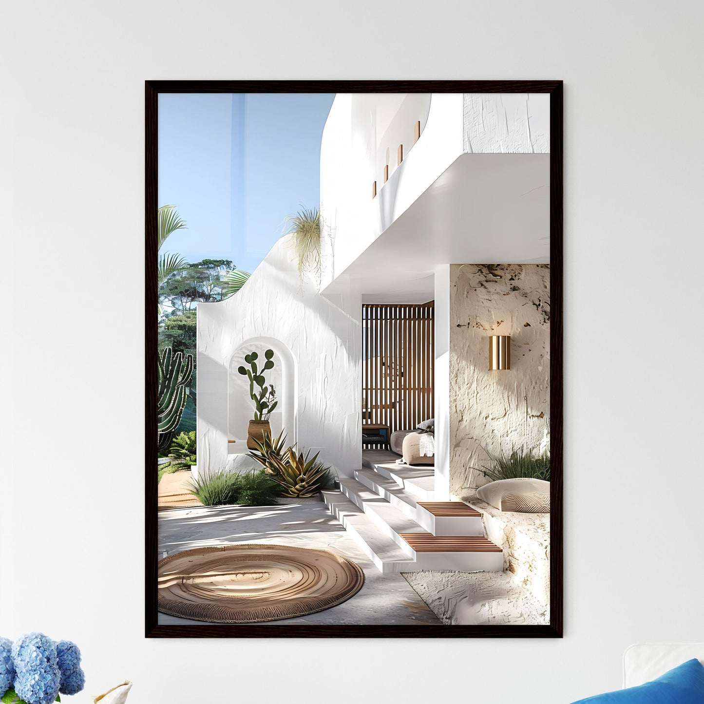 Modern Mediterranean-style villa with white walls, light wood accents, wooden outdoor rug, gold wall sconce, cacti, lush green landscape, vibrant art – Australian beachside mansion entrance. Default Title