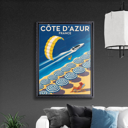“Côte d'Azur, France: A Vibrant Beach Scene with Parasailing and Colorful Umbrellas”