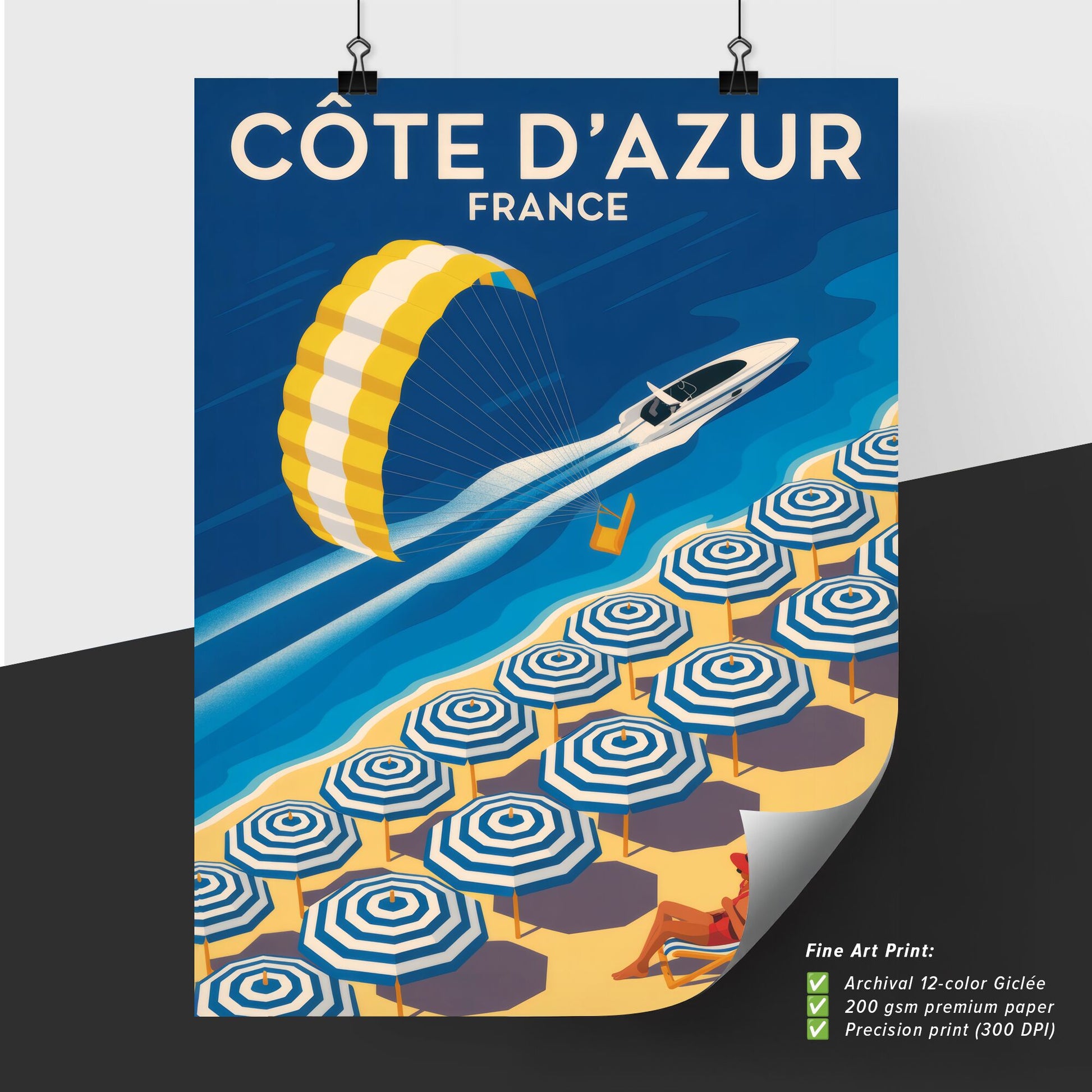“Côte d'Azur, France: A Vibrant Beach Scene with Parasailing and Colorful Umbrellas”