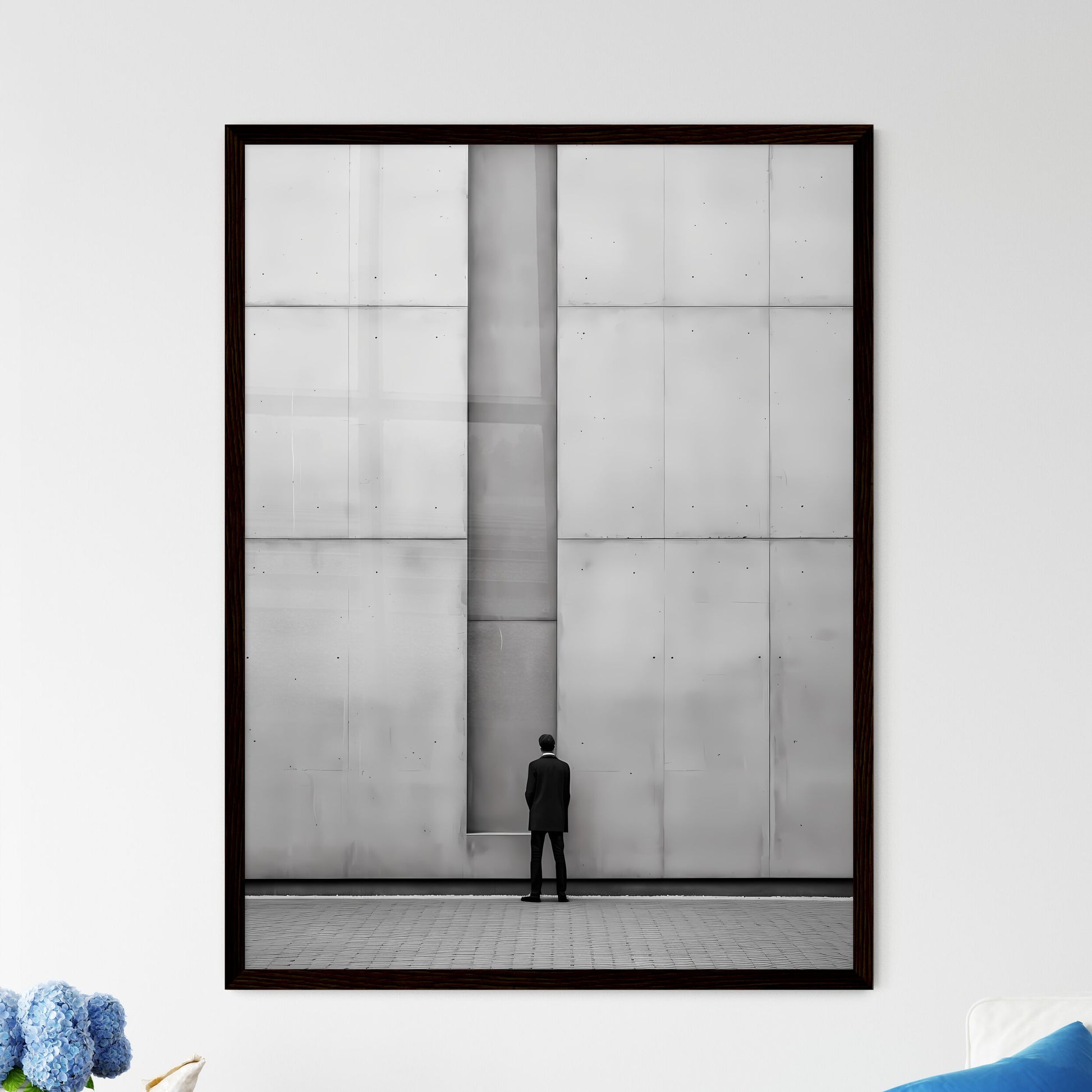 A Poster of diminished minimalism art - A Man Standing In Front Of A Wall Framed Art