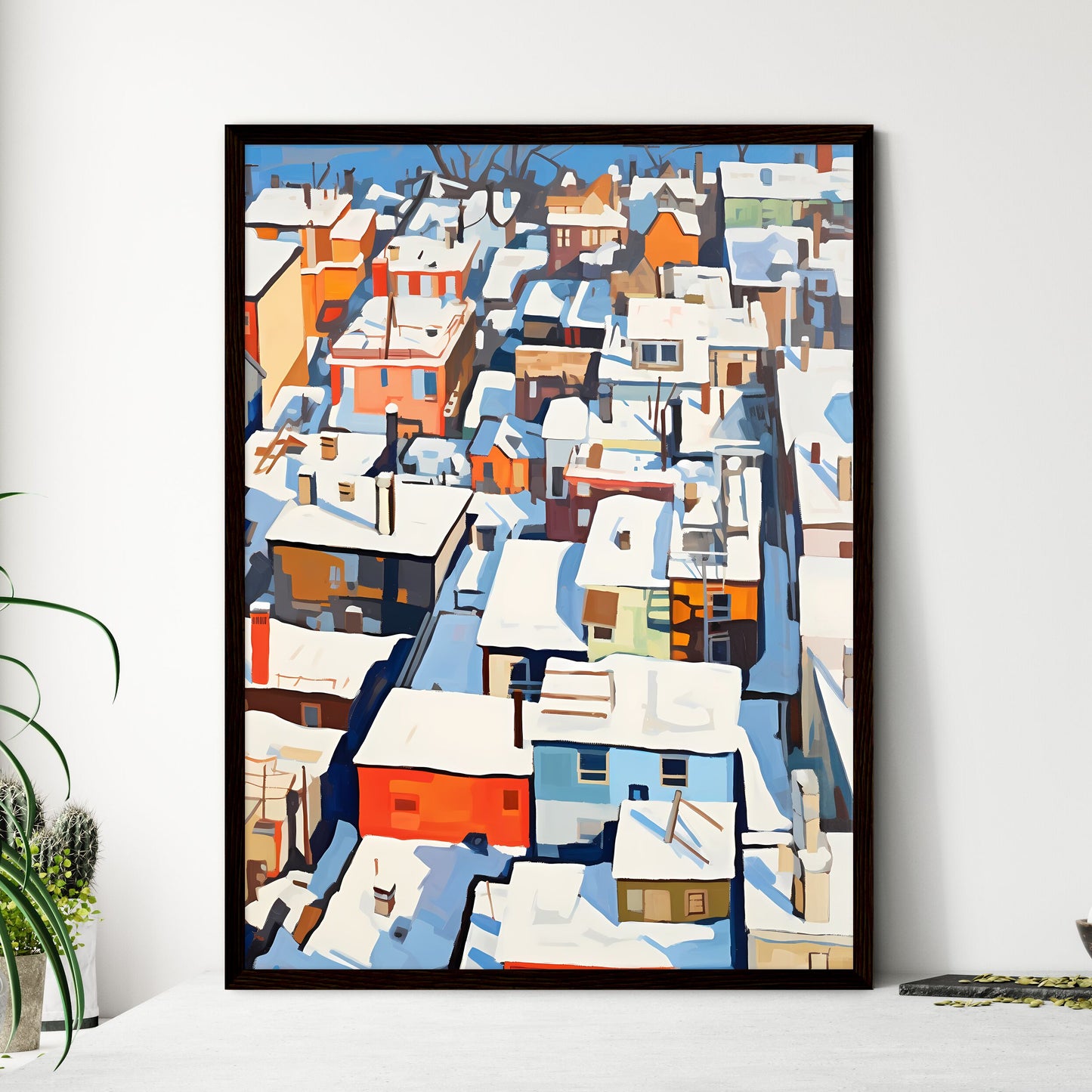 A Poster of snowy new york city roofs seen from above - A Group Of Buildings Covered In Snow Framed Art