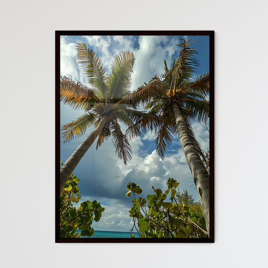 A Poster of two palm trees amidst a blue - A - Framed Art Print
