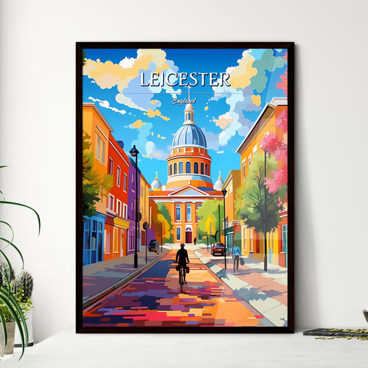 Leicester, England - Art print of a person riding a bicycle on a street with colorful buildings Framed Art