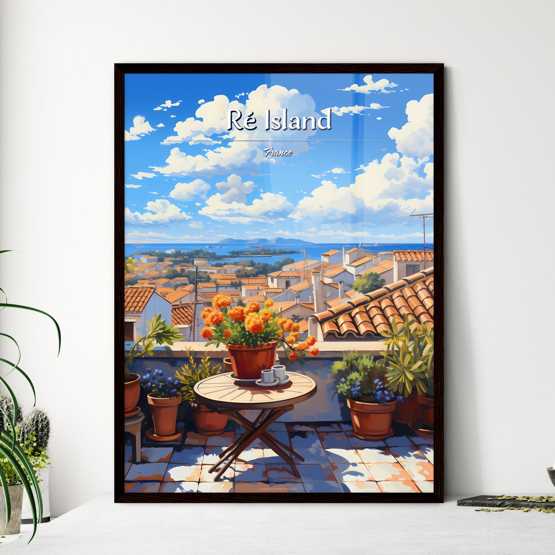 On the roofs of Ré Island, France - Art print of a table with flowers on it and a rooftop with a view of the sea and blue sky Framed Art
