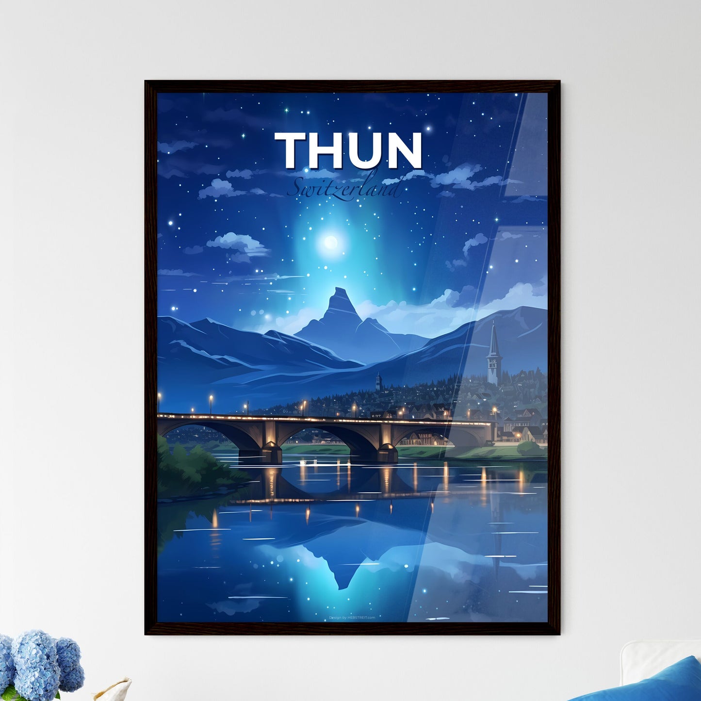 Thun, Switzerland, A Poster of a bridge over a river with a city and mountains in the background Default Title